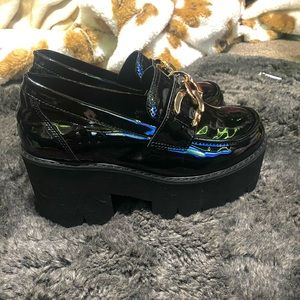 Black and gold platform shoes